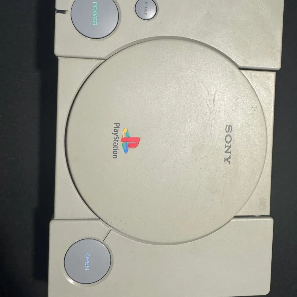 Sony PlayStation Console with Dual White Controllers